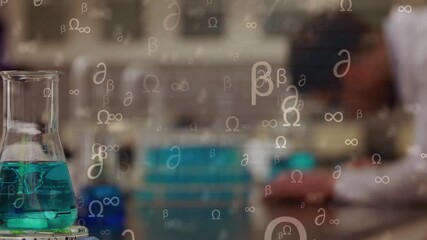 Animation of scientific symbols over lab glass