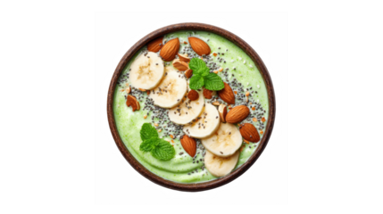 Healthy green smoothie bowl topped with banana slices, almonds, and chia seeds
