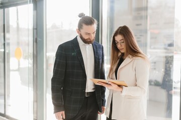 Business people collaborating on a digital tablet