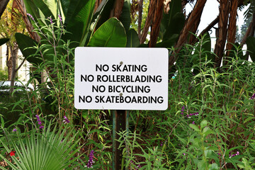 NO Skating, NO Rollerblading, NO Bicyling, NO Skateboarding sign