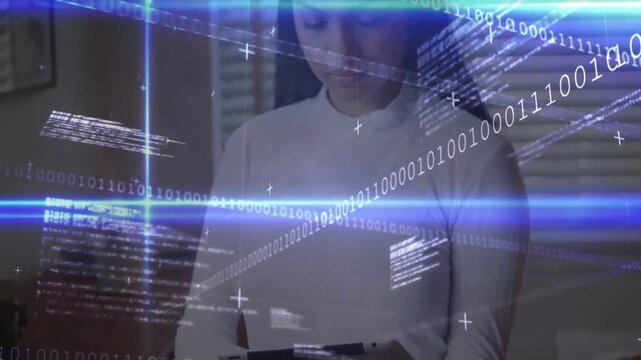 woman tapping tablet corner in tech studio initiating binary code and scrolling beams for analytics