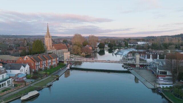Marlow, UK Sunset mid wide over the river at sunset looking back at the bridge.
