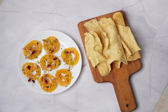 Jalebi fafda is a classic Gujarati food combination featuring crispy gram-flour fafda served with sweet, syrup-soaked jalebi. Popular as a festive breakfast and street food, especially during celebrat