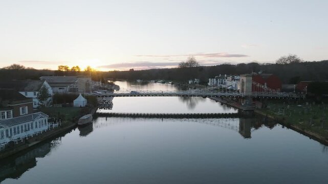 Marlow, UK Sunset slow push in over the river at sunset looking at the bridge.