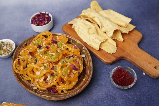 Jalebi fafda is a classic Gujarati food combination featuring crispy gram-flour fafda served with sweet, syrup-soaked jalebi. Popular as a festive breakfast and street food, especially during celebrat