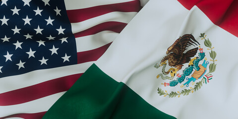 Two country flags on display showing unity between the United States and Mexico during a cultural event in a public space