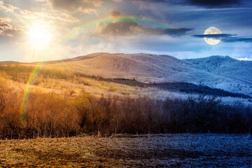 early spring rural landscape in mountains. day and night time change concept. beautiful view of...