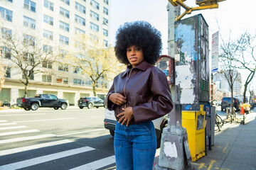 Confident black woman posing on a new york city street