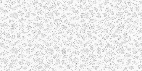 Fototapeta premium A grayscale image featuring a dense speckled and grainy texture pattern