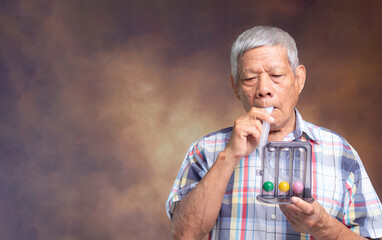 Senior man using inhaler respiratory health care.