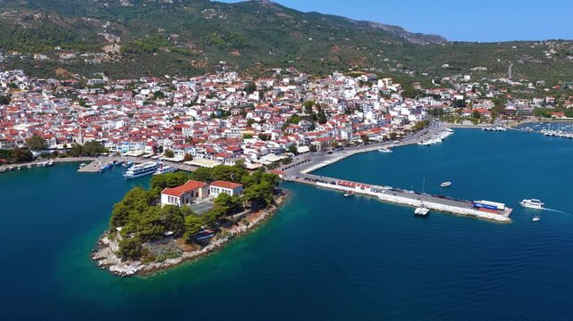 Panoramic aerial view of the town of Skiathos island, Sporades, Greece, with old and new port on a sunny summer day