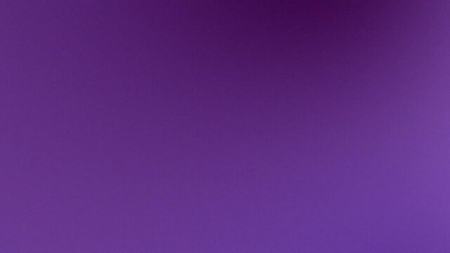 Solid deep purple abstract gradient background with smooth color backdrop for design and digital art