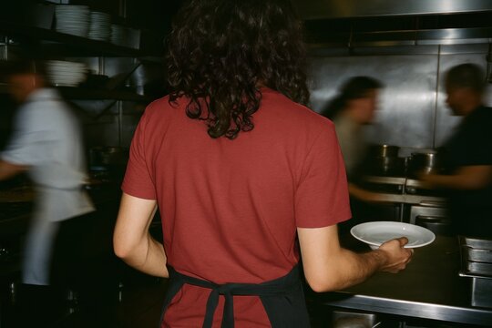 Busy kitchen staff in motion