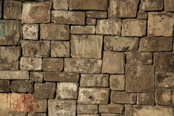 Stone tiles. Gray stone wall closeup background photo texture. Chipped Stone Path