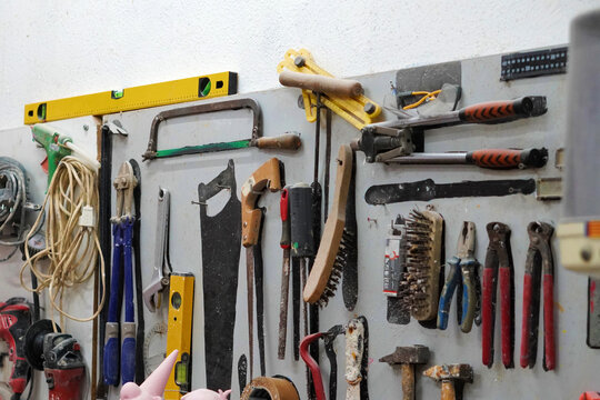 tool board with its silhouette hanging on the wall