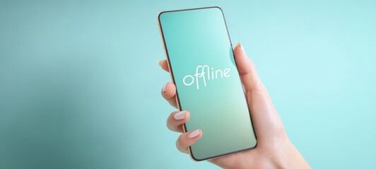 The Smartphone Showing Offline Message in Hand Against Minimal Teal Background