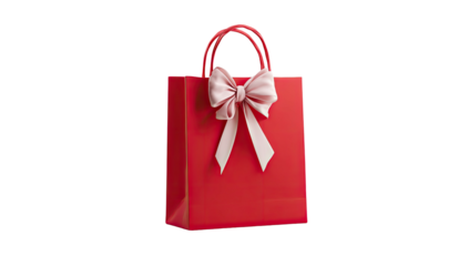 Glossy red gift bag with a light pink bow against a black backdrop