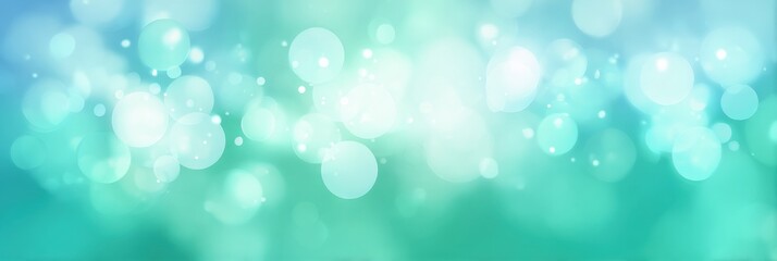 Obraz premium Soft blue and green bokeh background with light circles and gradients