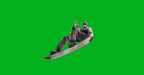 Snowboarding rider isolated on green screen. © Artur Didyk