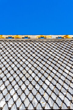 Ringebu Stave Church Wooden Roof Shingles Detail against Blue Sky