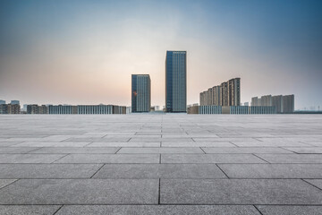 Fototapeta premium Modern Urban Skyline at Sunrise with Minimalist Perspective