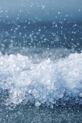 Obraz premium Frozen water droplets and ice close-up with blurred background