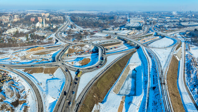 Krakow, Poland. Grebalow highway interchange under construction in winter. Last fragment of ring road around Krakow and joining S7 to A4. Aerial view. State in January 2026. Partially open for traffic