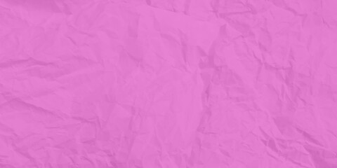 Fototapeta premium Close-up macro view of a wrinkled pink paper surface, A high-angle view of a sheet of pink paper, crumpled and wrinkled