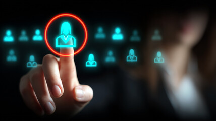 Finger selecting an employee icon on a digital interface symbolizing recruitment talent acquisition and human resources management.
