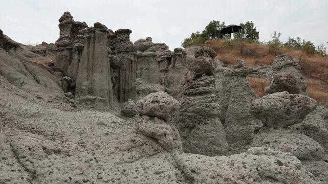 Natural stone town of Kuklica in northern Macedonia. Stone tables near the Kriva River