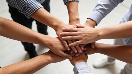 hands stacked together in unity