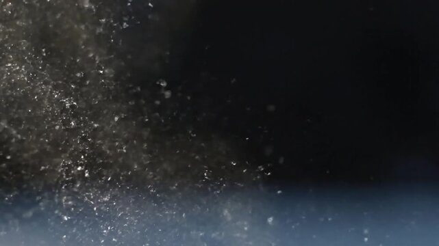 Wind-Swept Arctic Ice Dust Wide shot of a vast, desolate arctic landscape, with a low-angle sun casting long shadows as strong, cold winds whip up a shimmering, ground-level curtain of ice dust