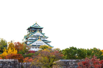 Osaka Castle in Japan with autumn leaves isolated on white background. Historical Japanese architecture and famous travel landmark during fall season. Ideal for graphic design.