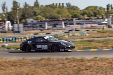 Obraz premium racing car. motorsport. circuit racing. dangerous moments on the track. high vehicle speed. sharp turn. demolition of wheels.