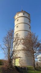 Old water tower in the German town. German architecture. City water  infrastructure