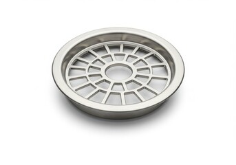 Naklejka premium Circular metal drain cover featuring a grid pattern, used for plumbing, water drainage, or industrial floor systems. 
