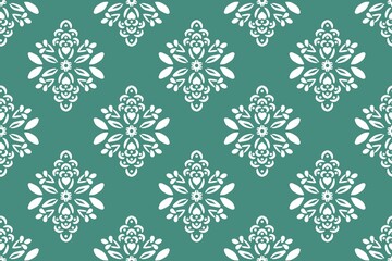 Seamless floral winter pattern with blue snowflakes and xmas ornaments in a illustration design for Christmas holiday decor