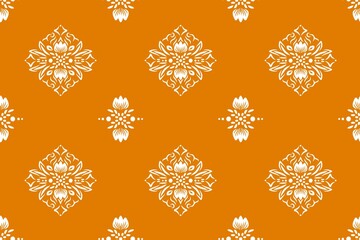 Vintage gold damask floral ornament pattern with victorian baroque swirls on a seamless silk textile texture for antique wallpaper decor