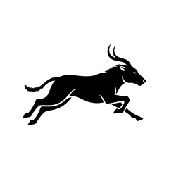 Silhouette of a running wildebeest.