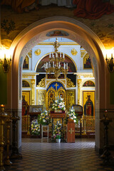 Obraz premium Church of the Holy Trinity on Sparrow Hills in Moscow, Russia. The interior of the church features a gilded iconostasis, traditional Russian Orthodox icon