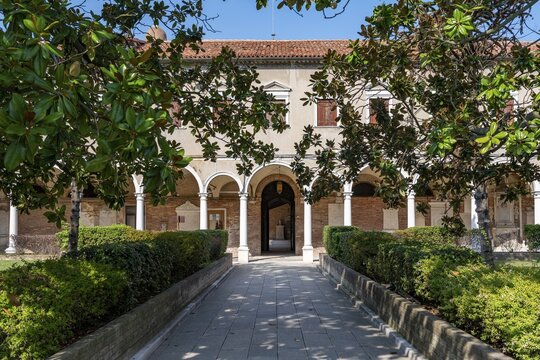 Cloister with tombs, church Chiesa di San Michele in Isola, cemetery island of San Michele, Venice, Italy