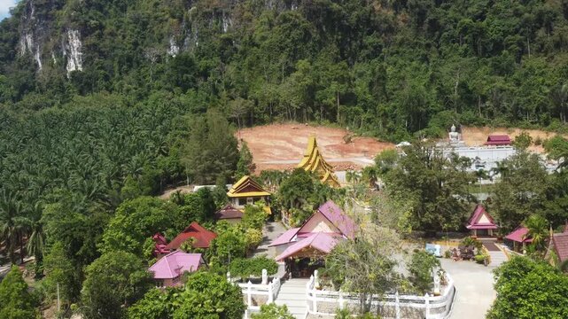 Golden Ubosot at Wat Khao Hua Sing, Krabi, Thailand