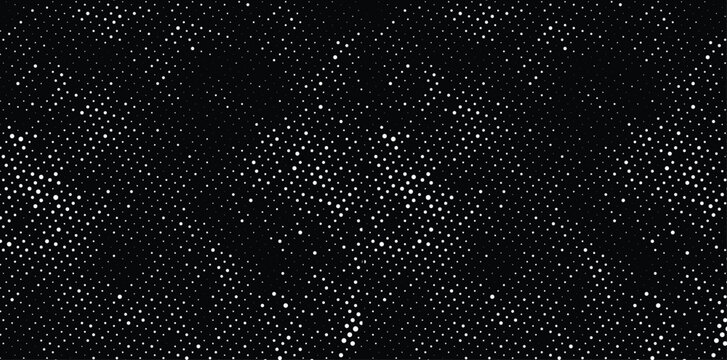 white halftone dots on black background