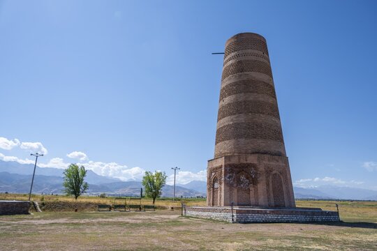 Burana Tower, remains of Karakhanid Minaret, histroic ancient city of Balasagun on the Silk Road, Balbals, historic tombstones in the shape of human faces, near Tokmok, Chuy, Kyrgyzstan