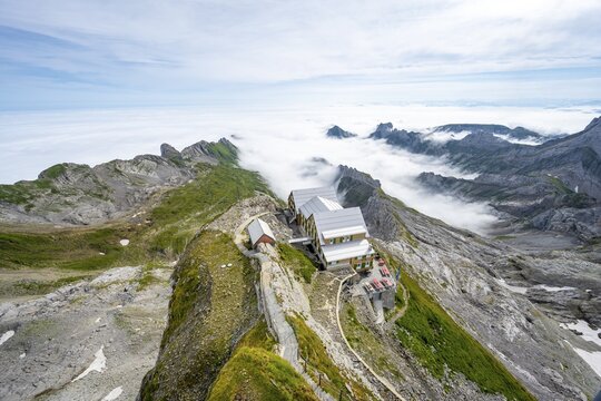 Berggasthof Alter S&auml;ntis at the summit of S&auml;ntis, mountain peak above the sea of clouds, high fog in the valley, S&auml;ntis, Appenzell Ausserrhoden, Appenzell Alps, Switzerland