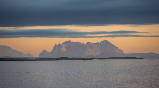 Sea and rocky mountain peaks, at sunset, Bod&oslash;, Nordland, Norway