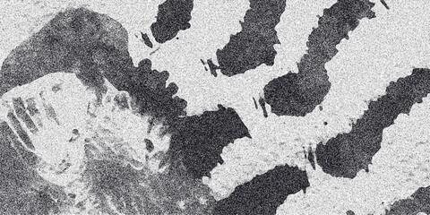 Abstract monochrome image with organic, blob-like shapes and a grainy texture, resembling a handprint or natural formations for artistic backgrounds