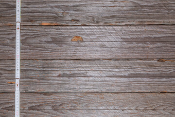 Rustic Wooden Workbench Background With Measuring Tape
