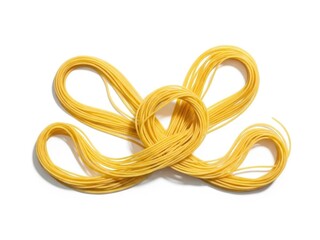 Naklejka premium Dry spaghetti pasta arranged in bow shape on white backdrop