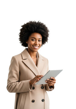 Young african american woman in a stylish beige coat, natural afro, holding a sleek digital tablet against a shadowless white studio background, concept of professional confidence and technology